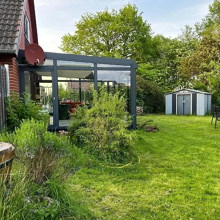 Hébergement de vacances Ostsee- Schleioase -grosser Garten Umzaeunt-hunde-baby-kajak *